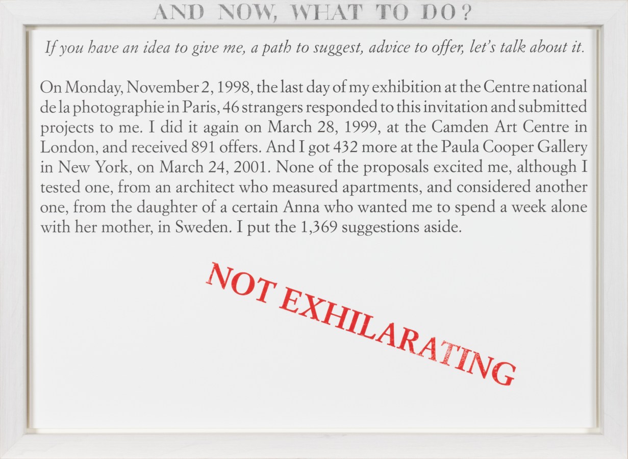 Color image of a white framed text panel with a red stamp of text reading 'Not Exhilarating'